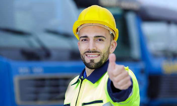 Construction worker with thumbs up