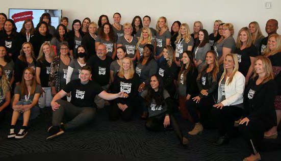 Group of women in carwash conference attendees.