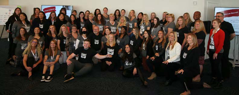 Group of women in carwash conference attendees.