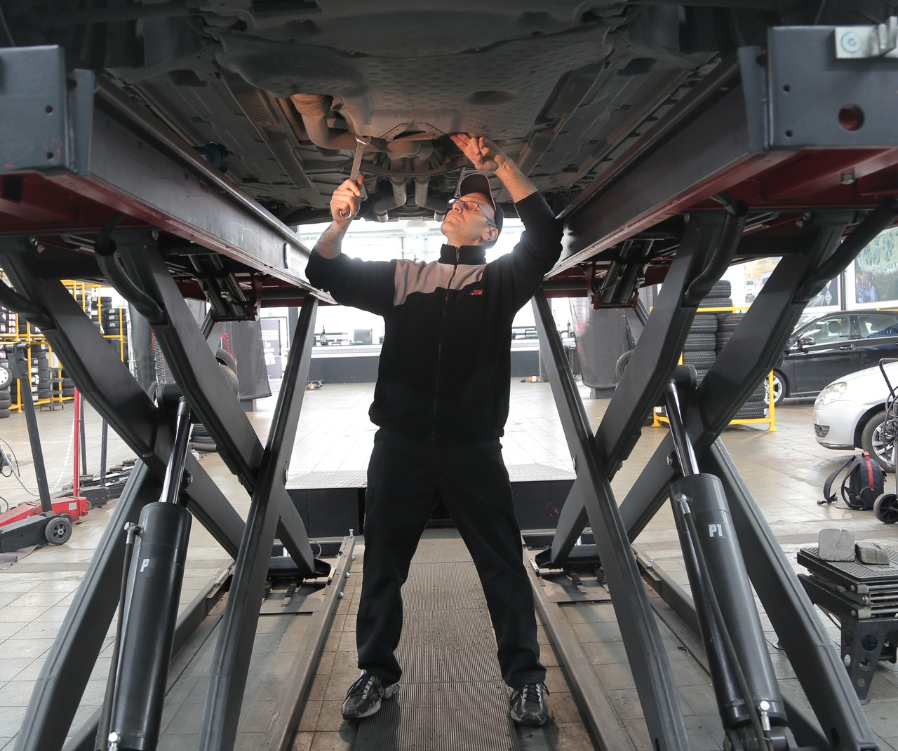 Man working under car