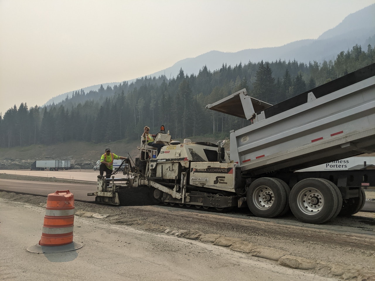 Highway workers with dumptruck