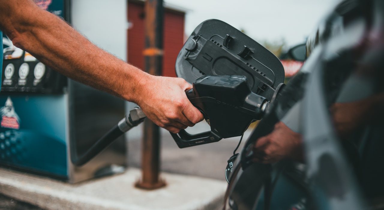 Man pumping gas