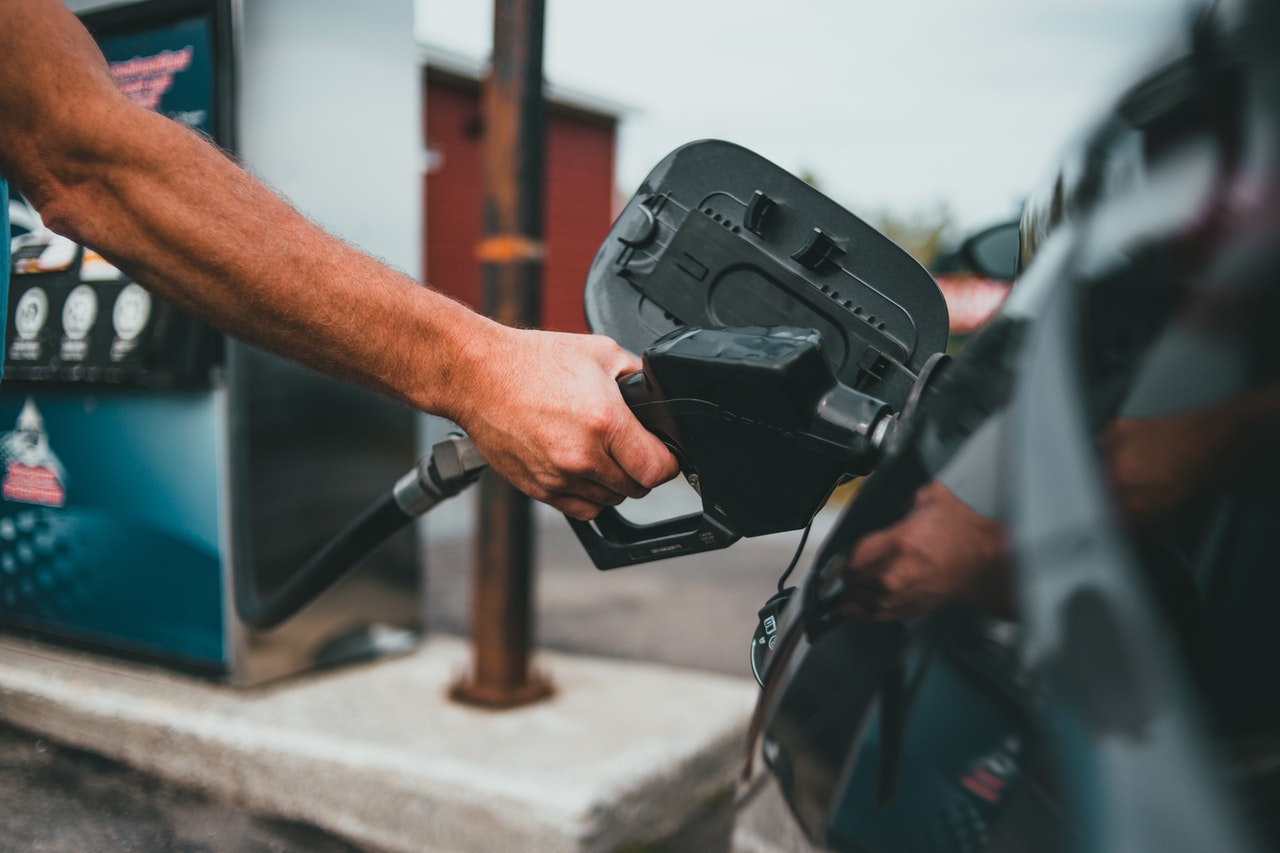 Man pumping gas